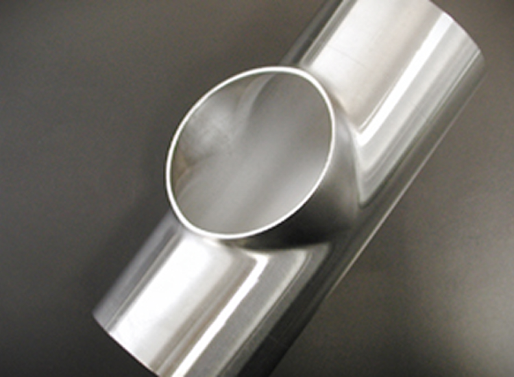 Tee pulling for custom sanitary process assemblies